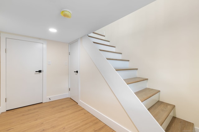 145 Lakeview Dr, Colchester, CT 06415 - staircase featuring wood finished floors and recessed lighting