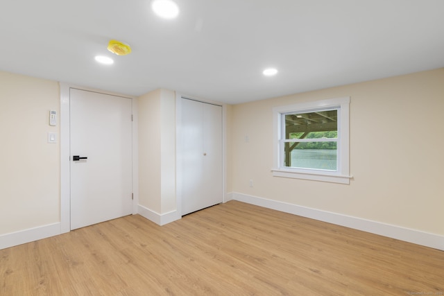 145 Lakeview Dr, Colchester, CT 06415 - empty room with light wood finished floors and recessed lighting