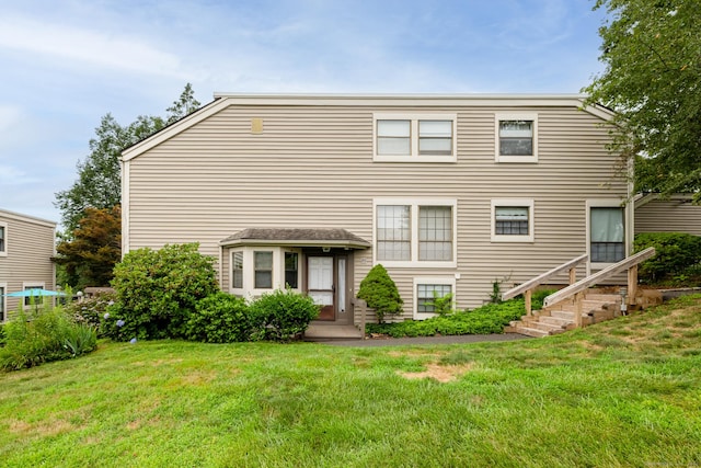 26 Stevens Pl Unit 26, Rocky Hill, CT 06067 - rear view of house with a yard and stairs