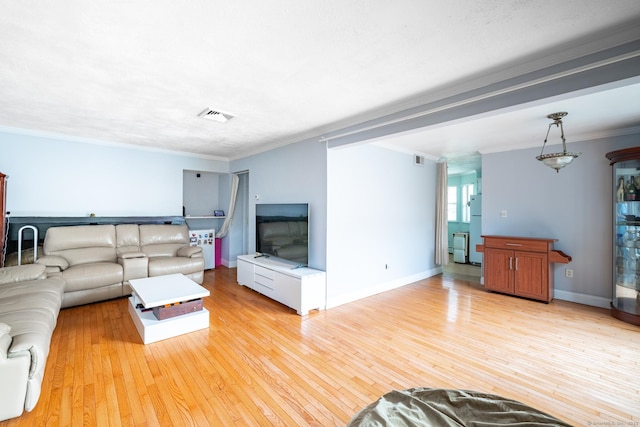 26 Stevens Pl Unit 26, Rocky Hill, CT 06067 - living area with crown molding and light wood finished floors