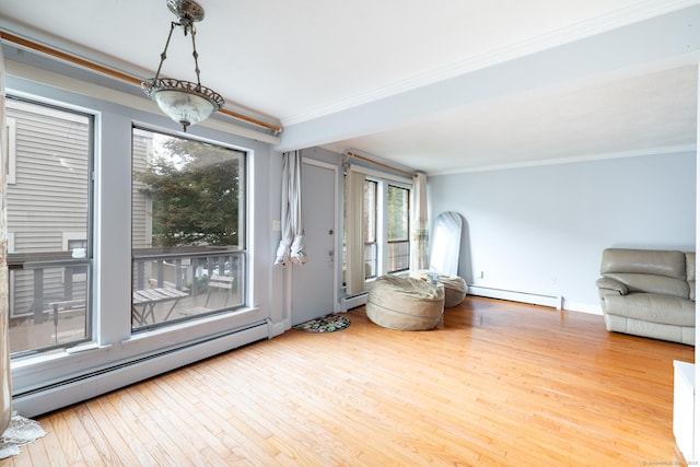 26 Stevens Pl Unit 26, Rocky Hill, CT 06067 - living area with ornamental molding, a baseboard radiator, and wood finished floors