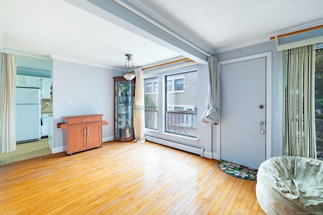26 Stevens Pl Unit 26, Rocky Hill, CT 06067 - entrance foyer with a baseboard radiator, healthy amount of natural light, light wood-style flooring, and crown molding