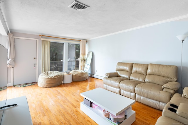 26 Stevens Pl Unit 26, Rocky Hill, CT 06067 - living area featuring crown molding, wood finished floors, and a baseboard heating unit