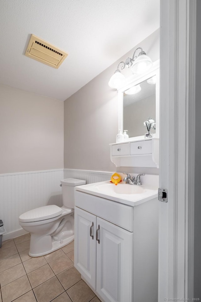 26 Stevens Pl Unit 26, Rocky Hill, CT 06067 - bathroom with a wainscoted wall, vanity, and tile patterned floors