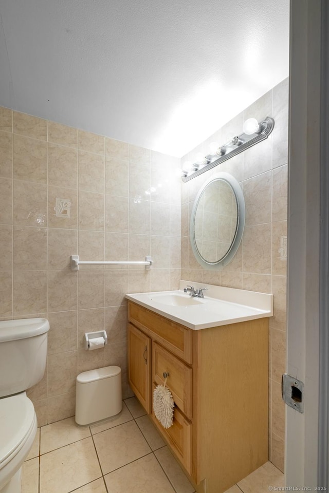 26 Stevens Pl Unit 26, Rocky Hill, CT 06067 - bathroom featuring tile walls, vanity, and tile patterned flooring