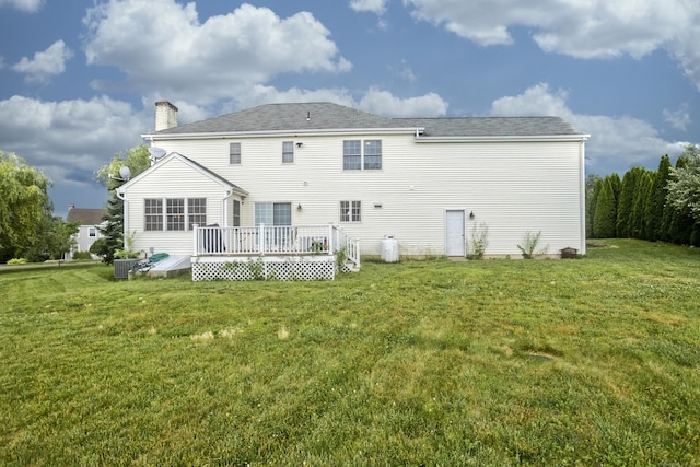 120 Scenic View Dr, Middletown, CT 06457 - rear view of house with a wooden deck, a yard, and a chimney