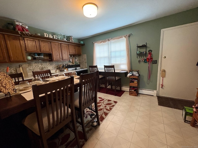 80 Beths Ave Apt 3, Bristol, CT 06010 - dining space featuring a baseboard heating unit
