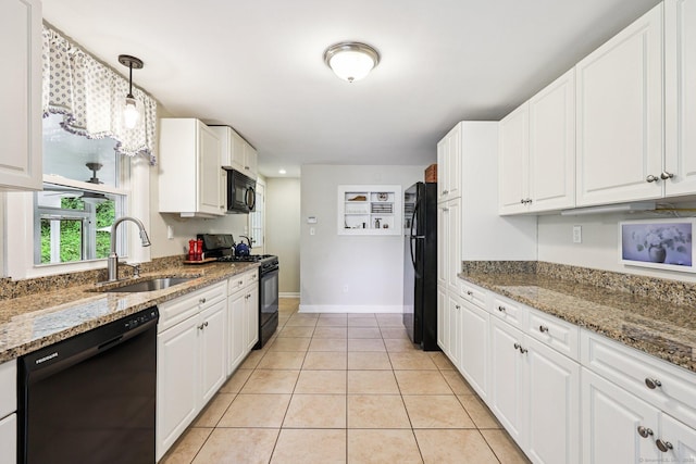 103 Glenwood Rd, Clinton, CT 06413 - kitchen with black appliances, white cabinets, light tile patterned floors, light stone countertops, and hanging light fixtures