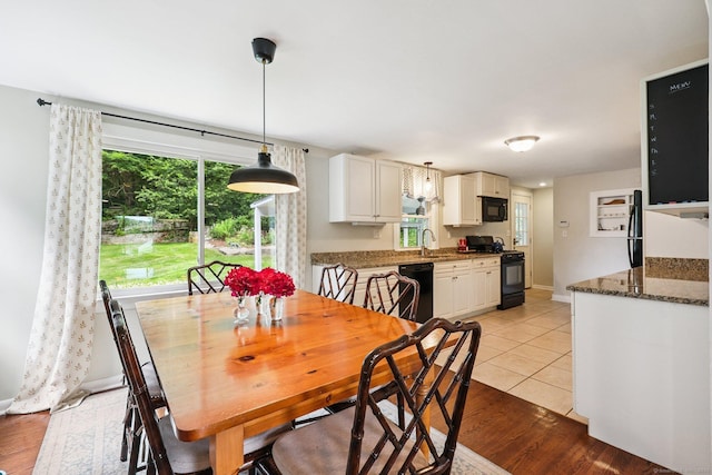 103 Glenwood Rd, Clinton, CT 06413 - dining room with baseboards and light wood-style flooring