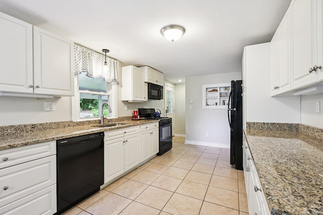 103 Glenwood Rd, Clinton, CT 06413 - kitchen with black appliances, white cabinets, light tile patterned floors, light stone countertops, and decorative light fixtures