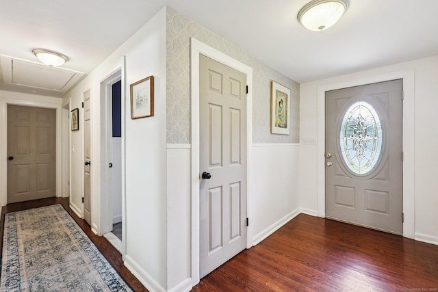 103 Glenwood Rd, Clinton, CT 06413 - foyer entrance featuring dark wood finished floors and baseboards