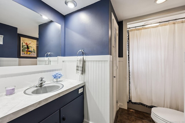 103 Glenwood Rd, Clinton, CT 06413 - full bathroom featuring vanity, tile patterned floors, and a wainscoted wall