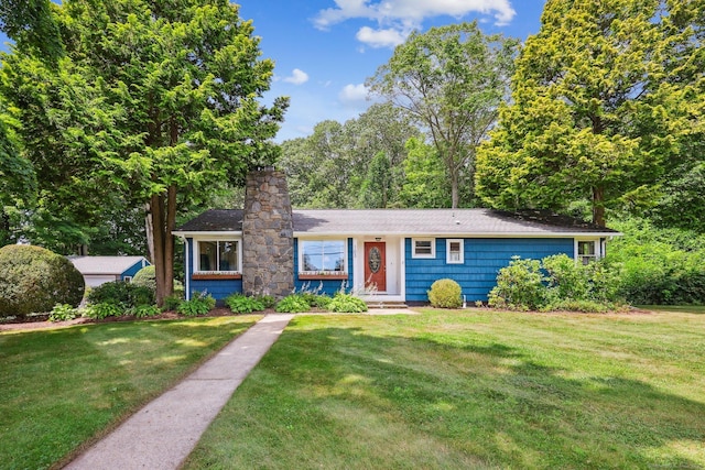 103 Glenwood Rd, Clinton, CT 06413 - view of front facade featuring a front lawn and a chimney
