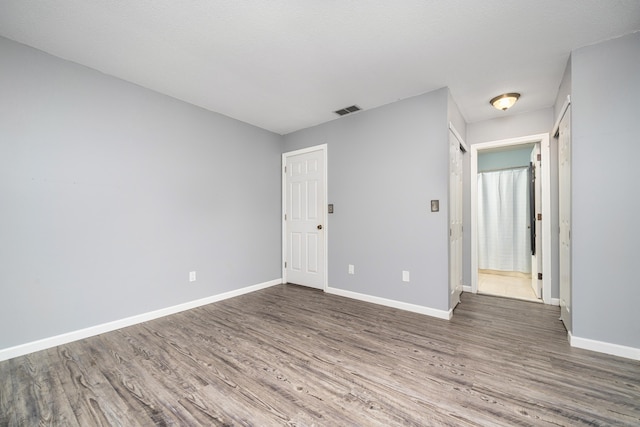 34 Cortland Way Unit 34, Newington, CT 06111 - empty room featuring wood finished floors and baseboards