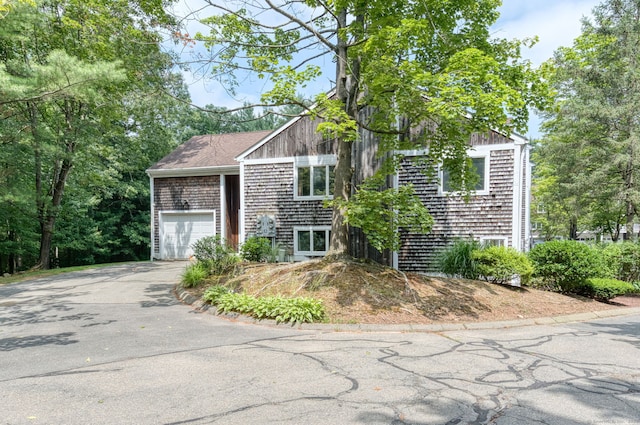 120 Songbird Ln Unit 120, Farmington, CT 06032 - view of front facade featuring asphalt driveway and a garage