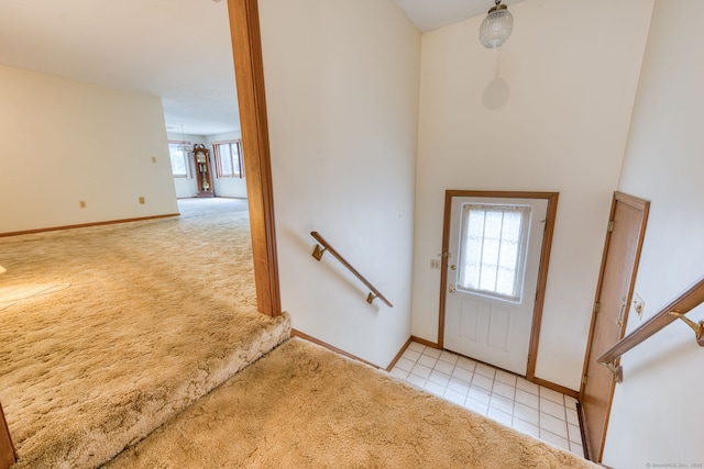 120 Songbird Ln Unit 120, Farmington, CT 06032 - entryway featuring light colored carpet and light tile patterned floors