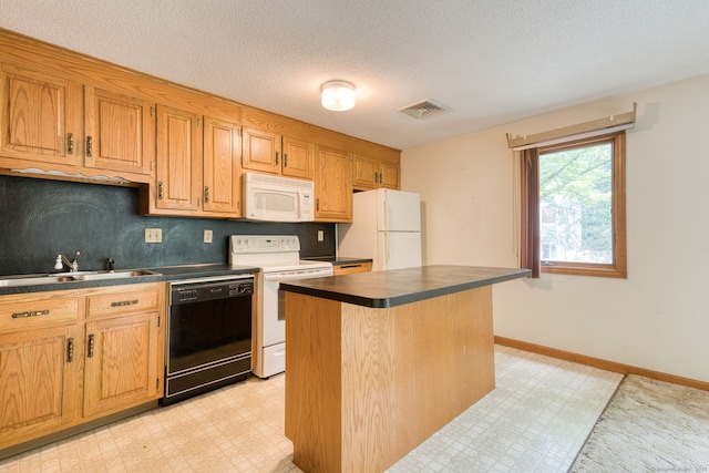 120 Songbird Ln Unit 120, Farmington, CT 06032 - kitchen featuring white appliances, dark countertops, light flooring, a kitchen island, and a textured ceiling