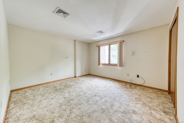 120 Songbird Ln Unit 120, Farmington, CT 06032 - carpeted spare room featuring a textured ceiling and baseboards