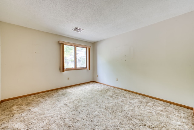 120 Songbird Ln Unit 120, Farmington, CT 06032 - empty room featuring carpet and a textured ceiling