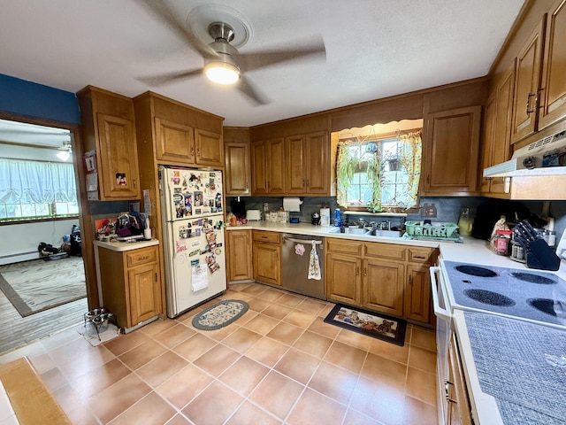 18 Booth Rd, Enfield, CT 06082 - kitchen featuring white appliances, ceiling fan, brown cabinetry, light countertops, and decorative backsplash
