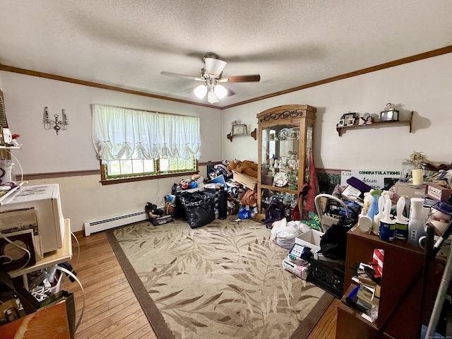 18 Booth Rd, Enfield, CT 06082 - office featuring a baseboard heating unit, ornamental molding, wood-type flooring, a textured ceiling, and ceiling fan