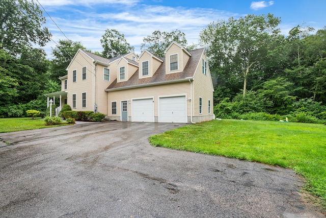 2 Autumn Way, Ledyard, CT 06339 - view of front of home with driveway, an attached garage, a front yard, and roof with shingles