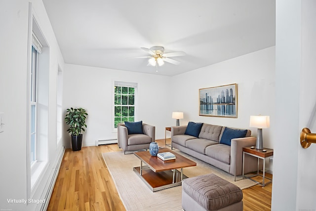 2 Autumn Way, Ledyard, CT 06339 - living area featuring baseboard heating, light wood-type flooring, and ceiling fan