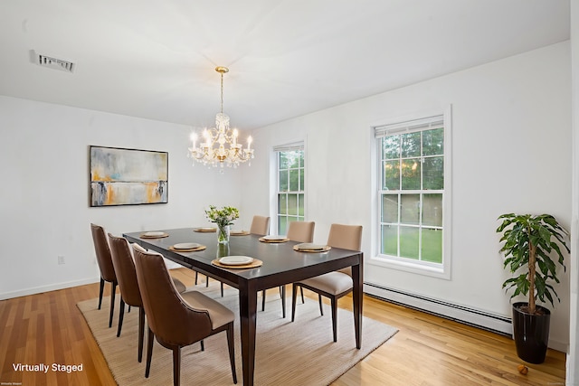 2 Autumn Way, Ledyard, CT 06339 - dining space featuring baseboard heating, a chandelier, and light wood finished floors