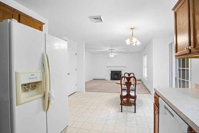 2 Autumn Way, Ledyard, CT 06339 - kitchen with white appliances, light countertops, a fireplace with raised hearth, ceiling fan, and light flooring