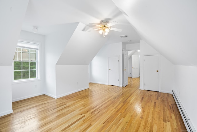 2 Autumn Way, Ledyard, CT 06339 - additional living space with a baseboard radiator, light wood finished floors, vaulted ceiling, and ceiling fan