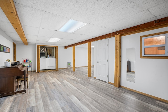 2 Autumn Way, Ledyard, CT 06339 - finished basement with a paneled ceiling, wood finished floors, and washing machine and dryer