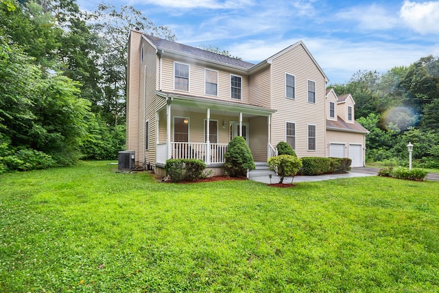 2 Autumn Way, Ledyard, CT 06339 - view of front of home with a porch, a chimney, a front yard, and driveway