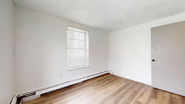 64 Van Block Ave Unit 9B, Hartford, CT 06106 - spare room with a baseboard radiator and wood finished floors