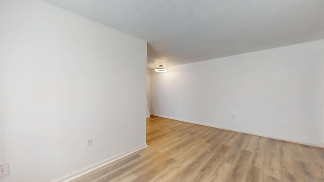 64 Van Block Ave Unit 9B, Hartford, CT 06106 - empty room featuring light wood-type flooring and baseboards