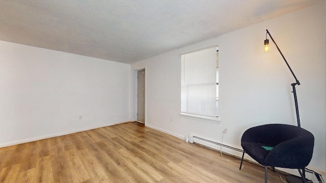 64 Van Block Ave Unit 9B, Hartford, CT 06106 - additional living space featuring light wood-type flooring and baseboard heating