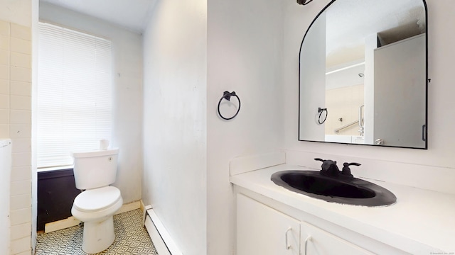 64 Van Block Ave Unit 9B, Hartford, CT 06106 - bathroom with baseboard heating, vanity, and tile patterned flooring