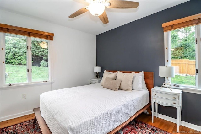 10 Fernbrook Dr, Brookfield, CT 06804 - bedroom featuring multiple windows, wood finished floors, and ceiling fan
