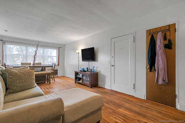 11 Bedford Ave Apt J2, Norwalk, CT 06850 - living area featuring wood finished floors and baseboards
