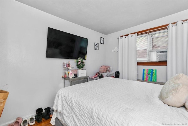 11 Bedford Ave Apt J2, Norwalk, CT 06850 - bedroom featuring baseboards and wood finished floors