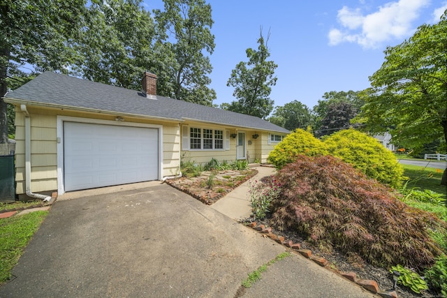 1 Oakridge Dr, Enfield, CT 06082 - ranch-style home with driveway, a chimney, a garage, and a shingled roof
