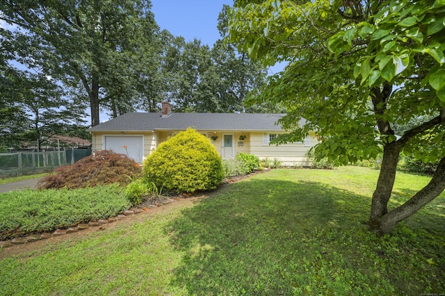 1 Oakridge Dr, Enfield, CT 06082 - view of front of property featuring a chimney and a garage