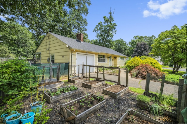 1 Oakridge Dr, Enfield, CT 06082 - view of outbuilding with a vegetable garden