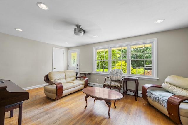 1 Oakridge Dr, Enfield, CT 06082 - living area with a ceiling fan, hardwood / wood-style floors, recessed lighting, and a baseboard heating unit