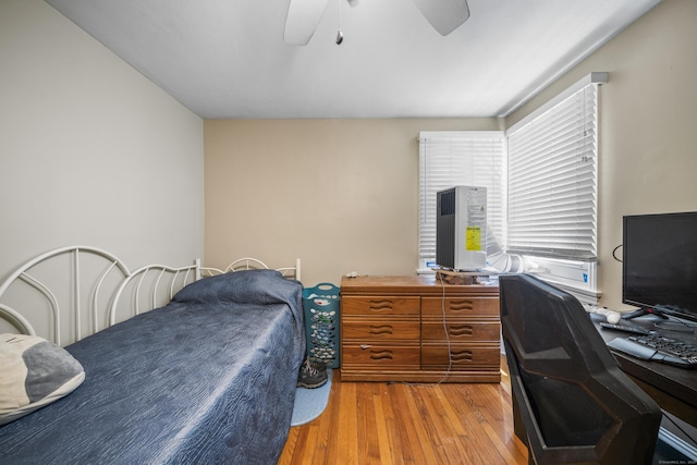 1 Oakridge Dr, Enfield, CT 06082 - bedroom with wood finished floors, a desk, and a ceiling fan