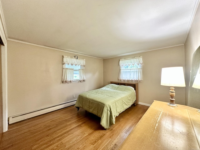 52 Midland Rd, Windsor Locks, CT 06096 - bedroom with a baseboard heating unit, multiple windows, crown molding, and wood finished floors