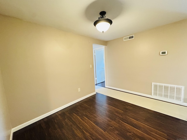 110 Trolley Crossing Ln Unit 110, Middletown, CT 06457 - spare room featuring dark wood finished floors and baseboards