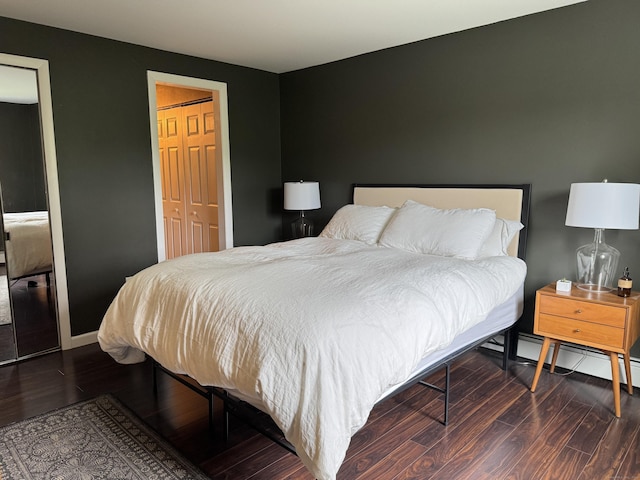 110 Trolley Crossing Ln Unit 110, Middletown, CT 06457 - bedroom featuring wood finished floors and a baseboard heating unit