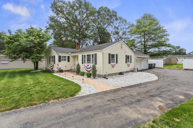15 Arlington Rd, Windsor Locks, CT 06096 - ranch-style home featuring a chimney, a garage, a gate, entry steps, and asphalt driveway