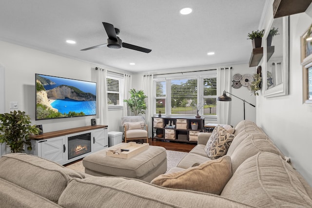15 Arlington Rd, Windsor Locks, CT 06096 - living room with recessed lighting, wood finished floors, ceiling fan, and a glass covered fireplace