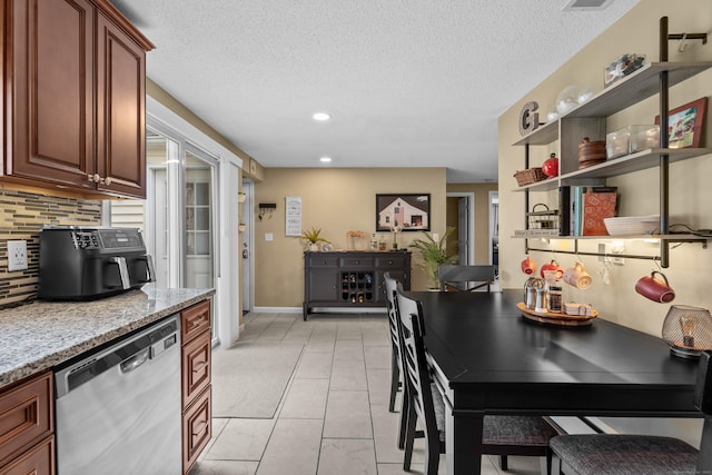 15 Arlington Rd, Windsor Locks, CT 06096 - dining room with a textured ceiling, light tile patterned floors, and recessed lighting
